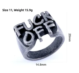 Macro detail of FUCK OFF punk style ring with dimensions and weight specs