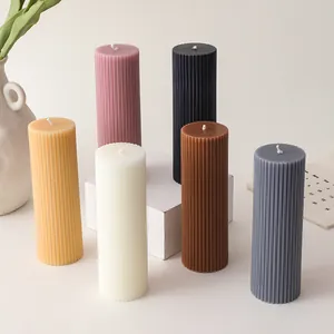 Morandi color ribbed pillar candles in yellow, purple, cream, black, coffee, and grey