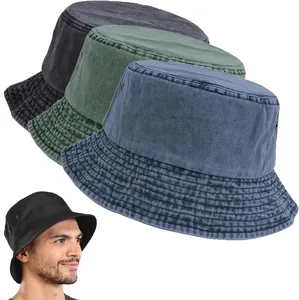 Detail showing vintage washed cotton bucket hats in navy, green and grey with metal eyelets