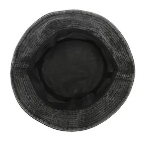 Detail view of washed denim bucket hat interior with black reinforced sweatband