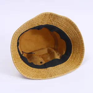 Ginger yellow denim bucket sun hat for women featuring black inner sweatband and stitching