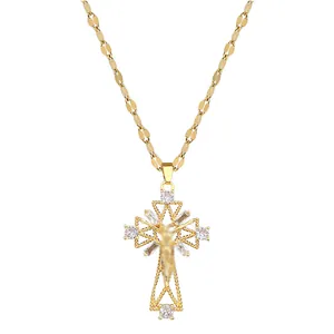 Luxurious gold cross pendant necklace with micro-paved crystals on a delicate metal chain