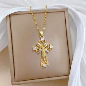 Macro shot of gold cross pendant with micro-inlaid zircons and detailed crucifix