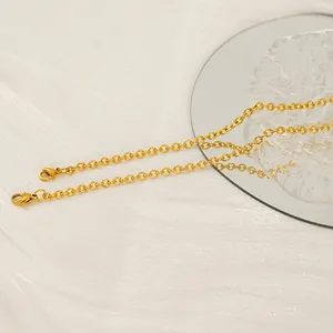 Minimalist 18K gold-plated stainless steel O-chain necklace on elegant satin background