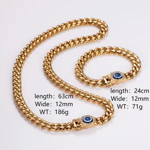 Set collana e bracciale a catena cubana dorata con occhio greco blu e strass lucidi