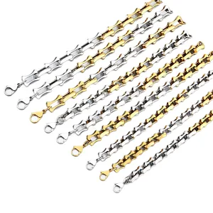 Stylish two-tone bamboo joint chain stainless steel men's bracelet on white backdrop