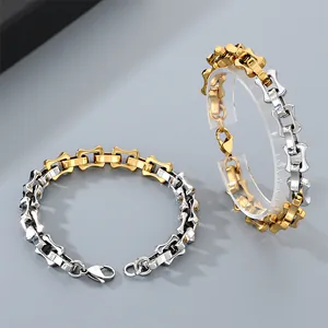Detailed view of two-color gold and silver titanium steel bamboo chain bracelet