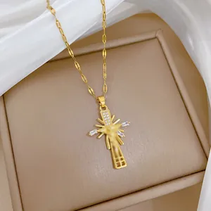 Elegant gold titanium steel cross necklace with crystal pavé and portrait pendant