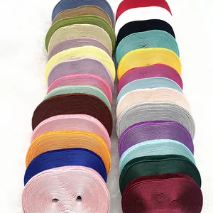 Detailed overhead shot showing an assortment of colorful velvet gift ribbons on fur