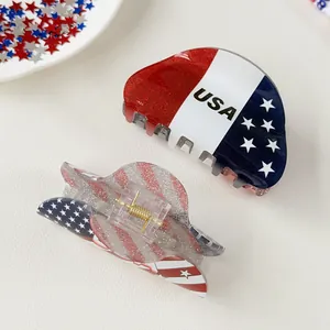 Lot de deux pinces à cheveux drapeau USA avec paillettes et étoiles sur fond blanc