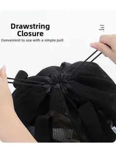 Action shot of mesh beach bag showing the draw rope bundle closure and handle detail