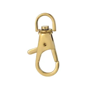 Close-up view of a small gold stainless steel swivel lobster clasp for jewelry connectors