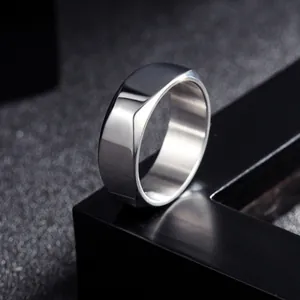 Minimalist 8mm wide polished silver titanium steel ring for men in sleek industrial style