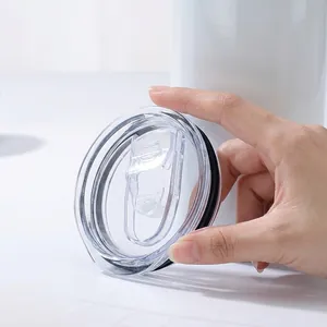 Transparent 20oz tumbler lid with sliding closure and black rubber seal for coffee cups