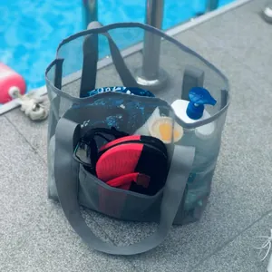 Grey mesh beach bag with large capacity for pool accessories by the swimming pool