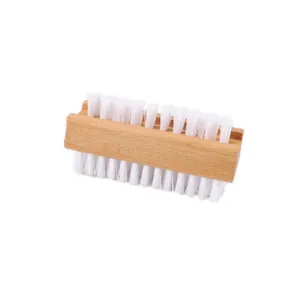 Detail of double-sided wooden nail brush with high-density bristles for hand cleaning