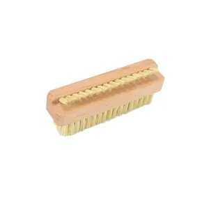 Close-up of double-sided beech wood nail brush with natural sisal and PP bristles