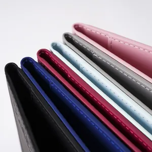 Close-up of precise stitching and vibrant color options for embossed map passport covers