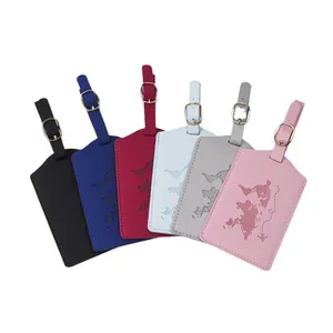Leather luggage tags in six colors featuring embossed world map and golden buckles