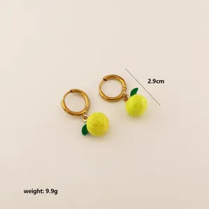 Detail view of lemon earrings with 2.9cm height and 9.9g weight in gold-plated steel