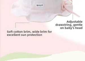 Macro shot of soft cotton brim and adjustable drawstring on pink baby sun hat