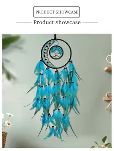 Detail of teal feathers and tree of life weaving on bohemian dream catcher hanging