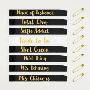 Set of 8 satin bachelorette party sashes in white and black with gold safety pins