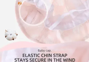 Detail of baby sun hat with elastic windproof strap and soft cotton texture