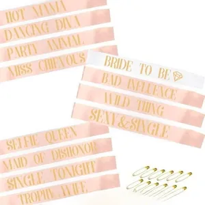 Set of 12 satin bachelorette party sashes with gold Bride to Be lettering and pins