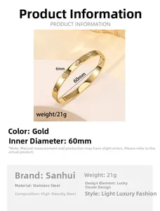 Detailed view of gold clover bangle with 60mm diameter and 6mm width measurements
