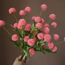 Detailed view of pink artificial pompom mum bouquet with delicate layered silk petals
