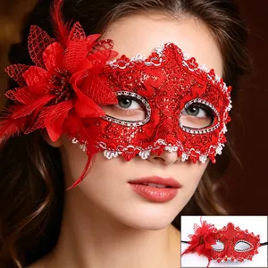 Elegant red lace masquerade mask with floral accent and feathers for Halloween parties