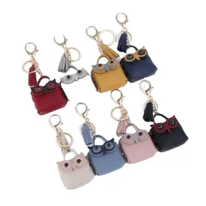 Cute owl-shaped mini coin purse and keychain set with tassel charms in eight colors