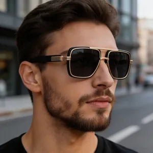 Close-up of premium black and gold polarized sunglasses worn by a male model