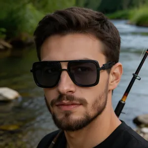 Close-up of matte black double-bridge polarized sunglasses on model in outdoor fishing scene