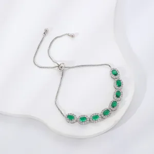 Adjustable gold plated oval emerald green zircon bracelet with halo setting on stone