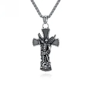 Macro shot of silver Archangel Saint Michael shield relief on cross pendant necklace