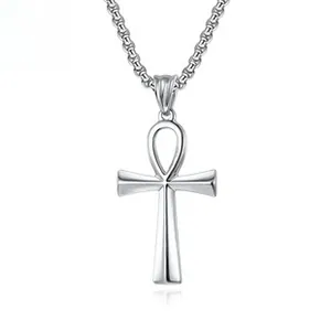 Detailed view of polished silver Ankh cross pendant on a thin stainless steel chain