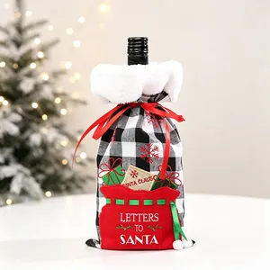Detail of buffalo plaid wine bottle cover with faux fur collar and embroidered Santa pocket