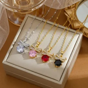 Elegant bow zircon pendant necklaces in various gem colors on satin jewelry box