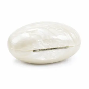 Elegant heart-shaped ivory acrylic clutch with pearlescent marble texture and silver clasp