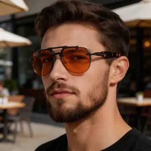 Side view of men's rimless steampunk sunglasses with orange lenses and tortoiseshell temples