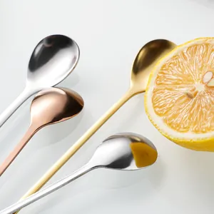 Leaf-shaped stainless steel coffee spoons in gold and silver with mirror finish