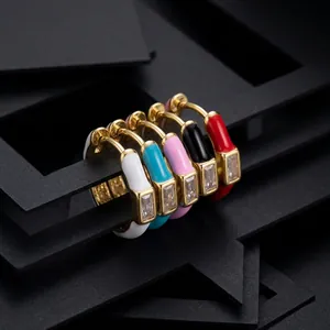 Close-up of five colorful enamel hoop earrings with micro-set zircon stones in 5 colors
