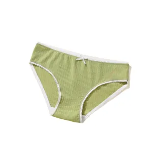 Light green polyester panties with white lace trim and a small bow on white background