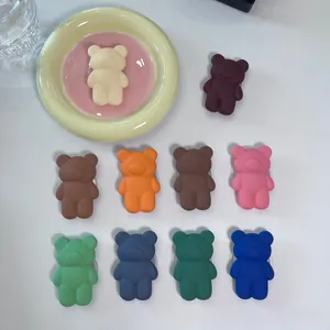 Detailed top view of matte silicone bear phone grips in multiple vibrant colors