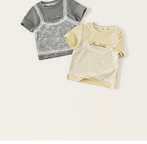 Close-up of girls' cotton t-shirt with lace splicing and layered fake two-piece detail
