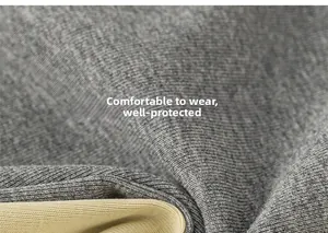 Detailed macro view of gray ribbed knit fabric with soft beige lace edge for girls' top