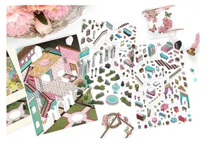 Macro view of DIY miniature room stickers with hand-drawn furniture and floral decor