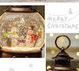 Detail of vintage bronze Christmas lantern with family snowman snow globe and glowing glitter